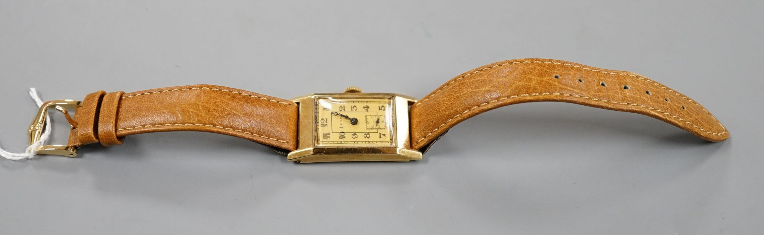 A gentleman's yellow metal Laco manual wind wrist watch, on later associated leather strap.